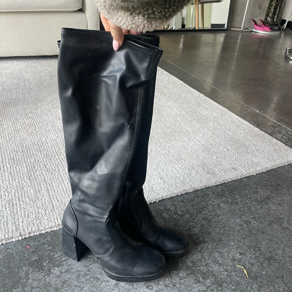 Tall black boots